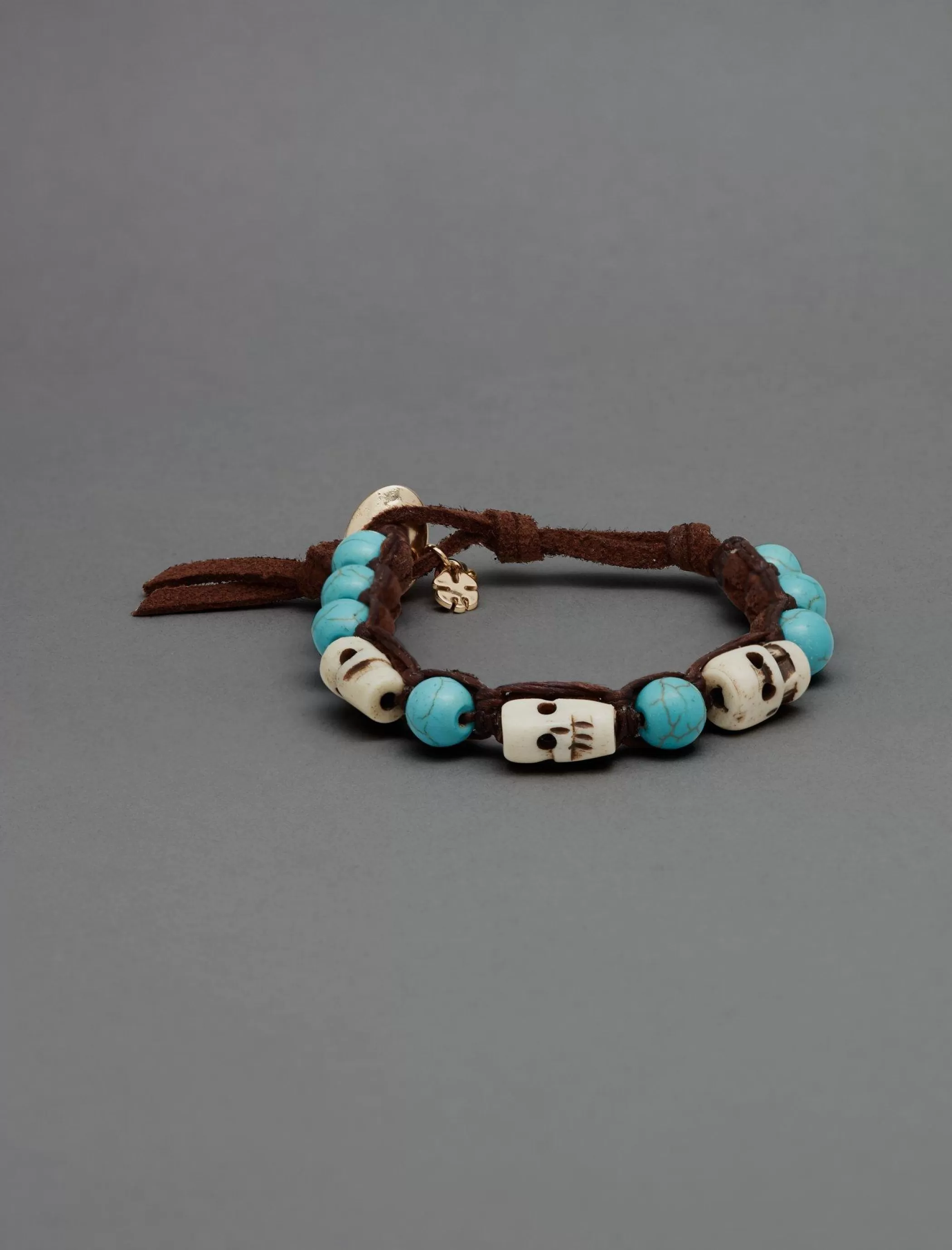 Lucky Brand Jewelry*turquoise and carved skull wrap bracelet gold